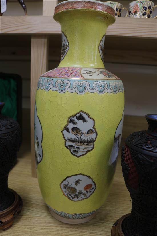 A pair of Chinese two colour carved lacquer vases and a Chinese yellow ground vase tallest 46cm